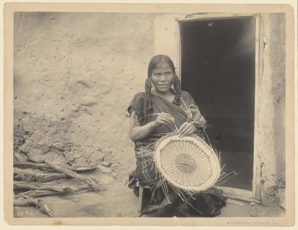 Hopi-byer, kurvemager af Adam Clark “A. C.” Vroman