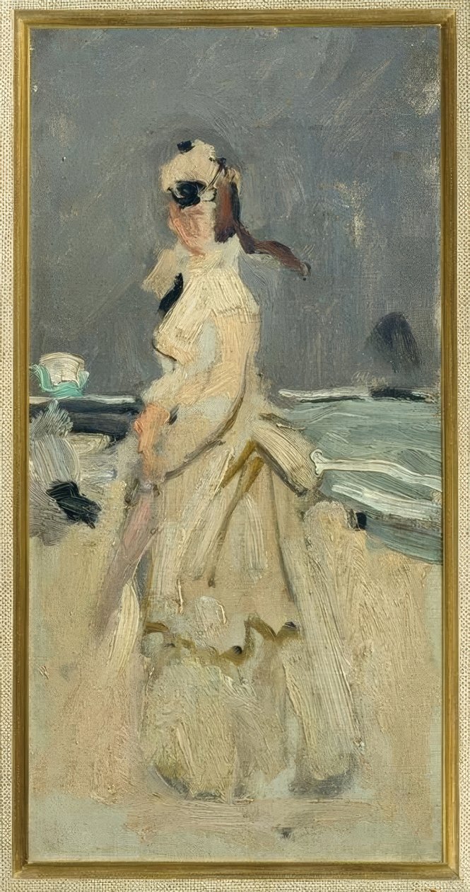 Camille på stranden af Claude Monet