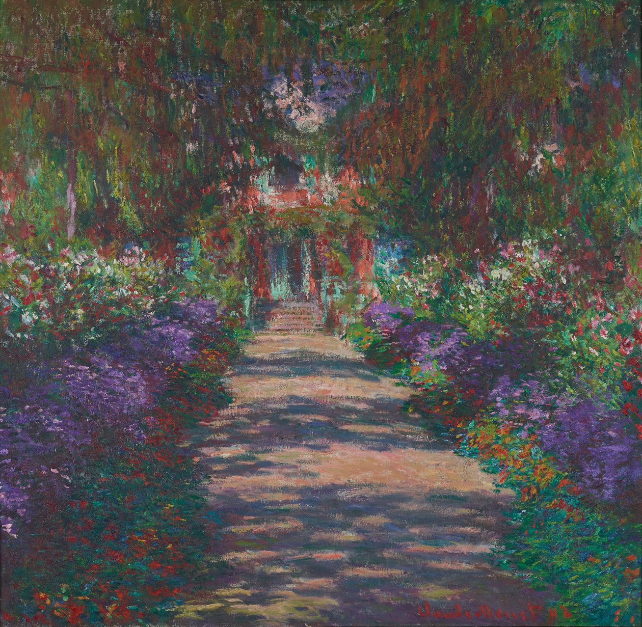 En allé i Monets have ved Giverny af Claude Monet