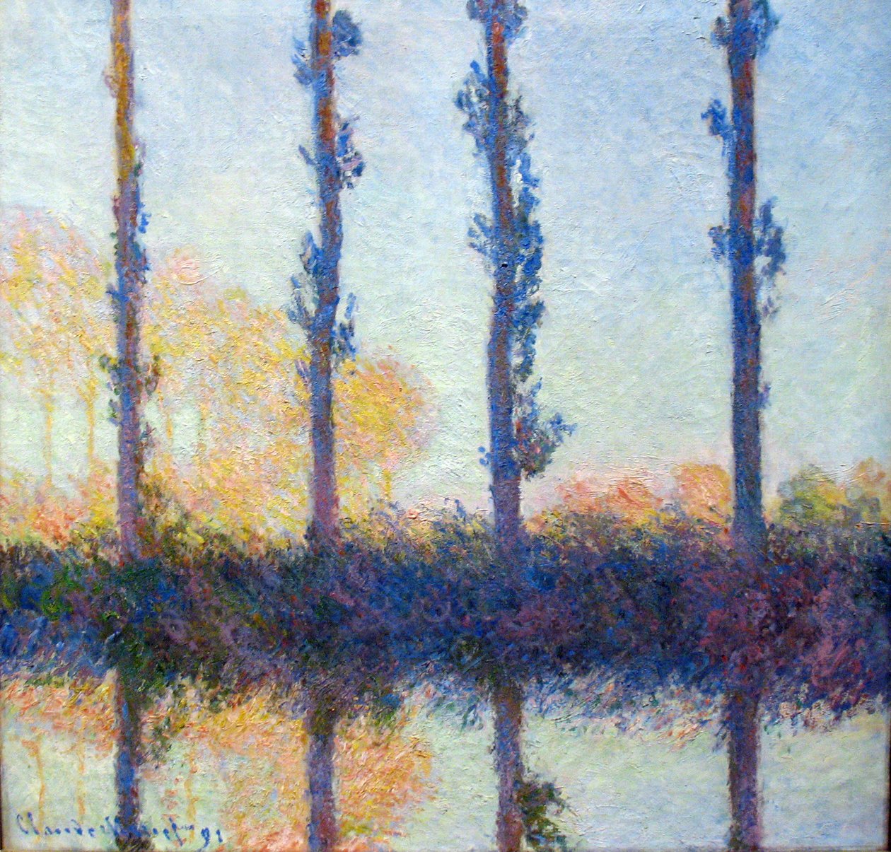 De fire træer af Claude Monet
