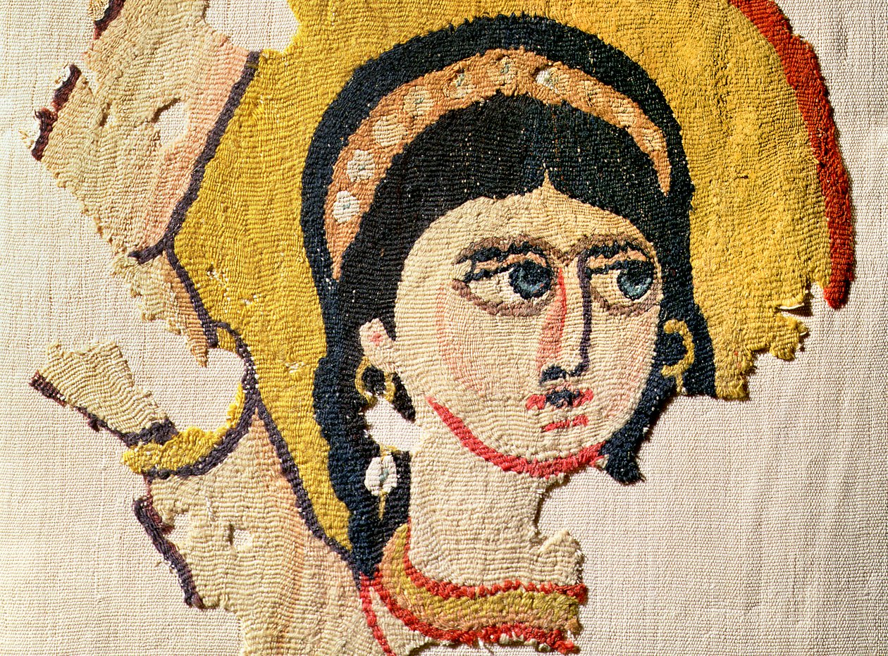 Fragment af et gobelin, der forestiller hovedet af en danser uld- og hørdetalje af 107971 af Coptic