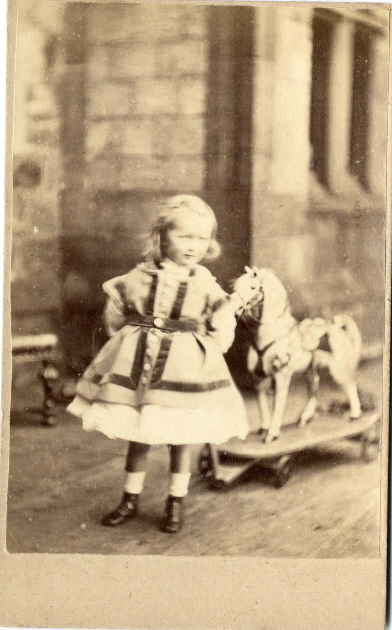 Ung pige med sin legetøjshest, 1860
