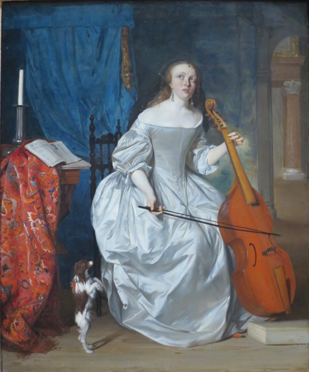 Kvinde spiller viola de gamba af Gabriel Metsu