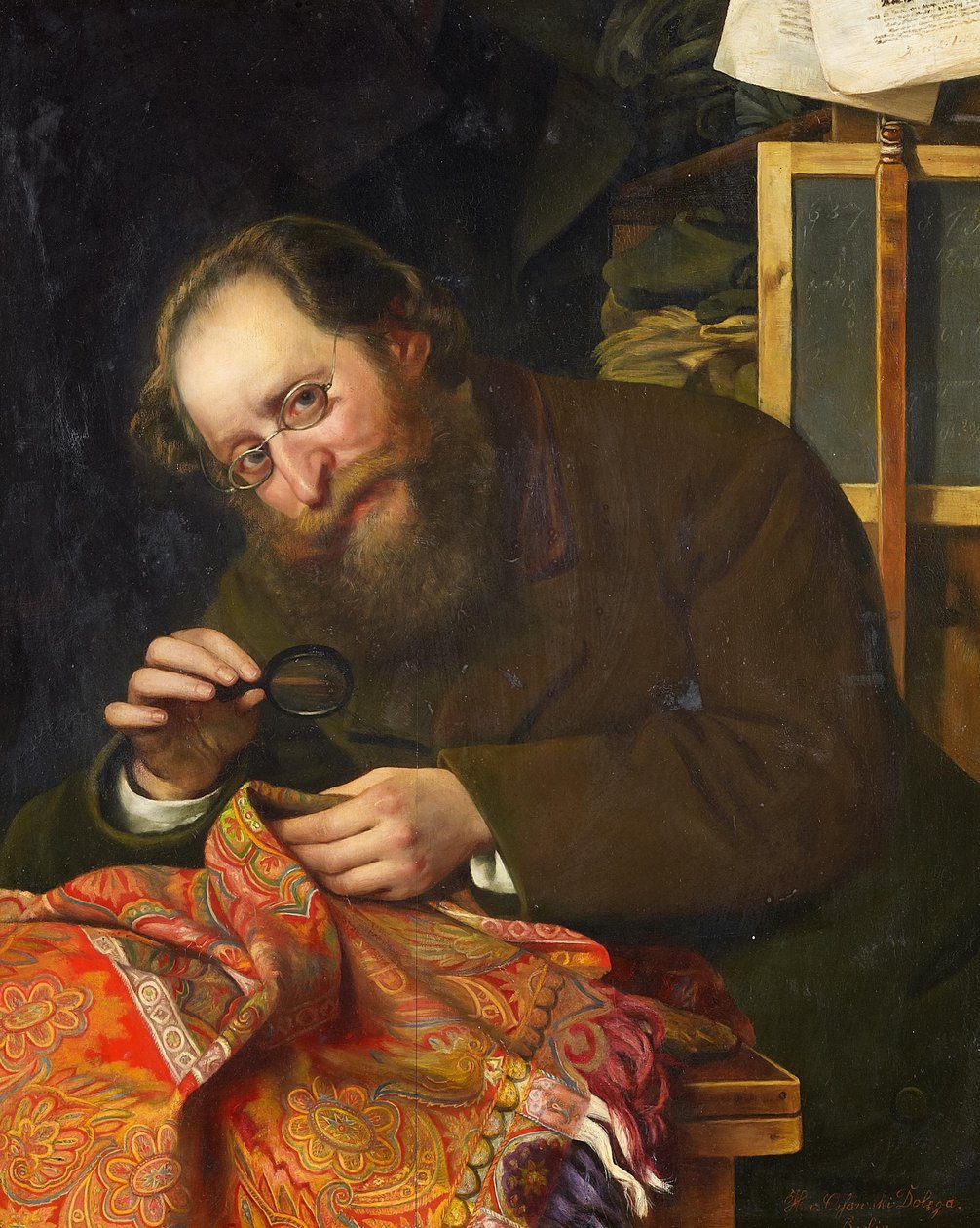 Portræt af en skægget herre, der studerer et gobelin med forstørrelsesglas af H. von Ossowski Dolega