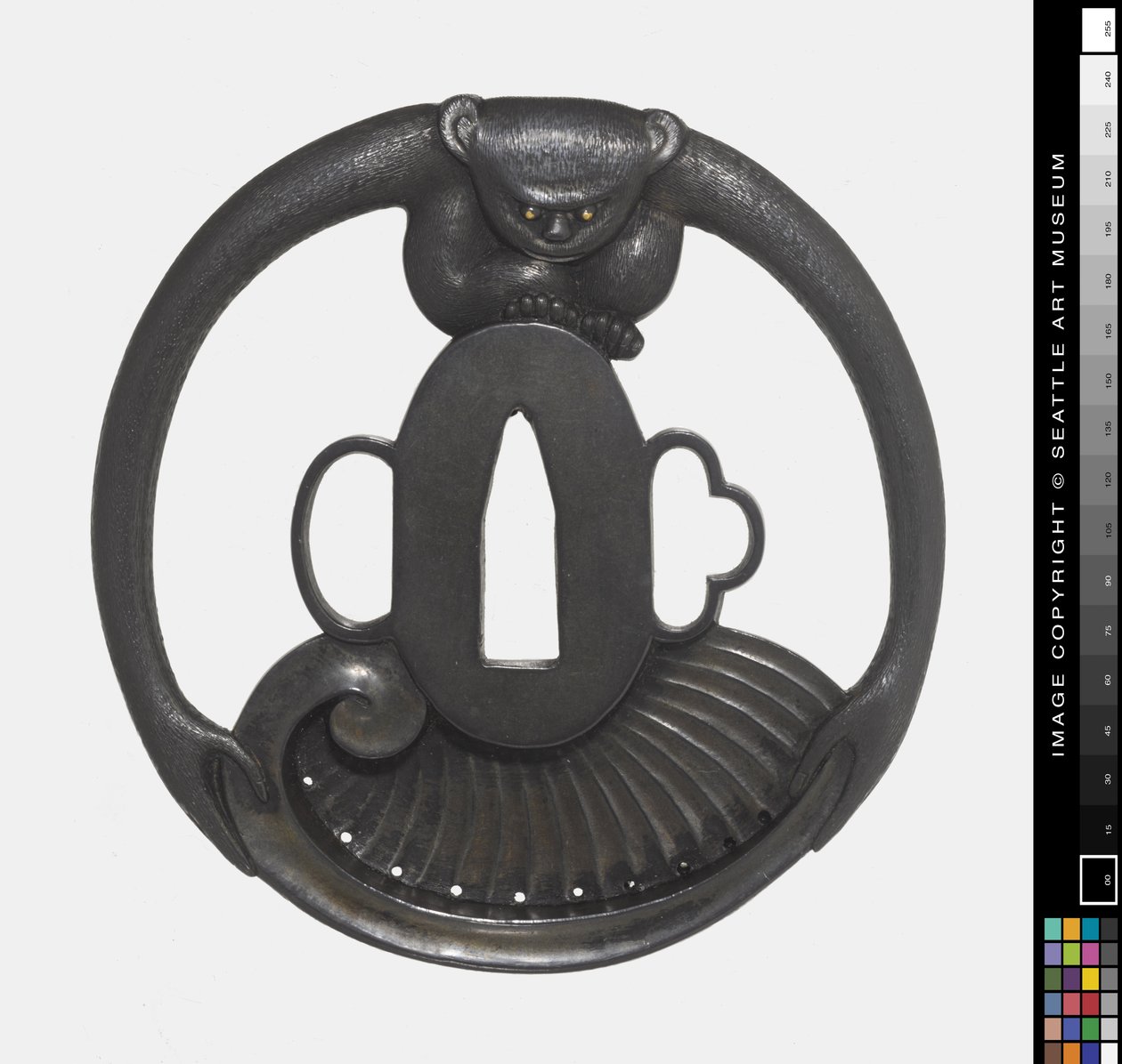 Tsuba: Monkey Holding Shell af Japanese School