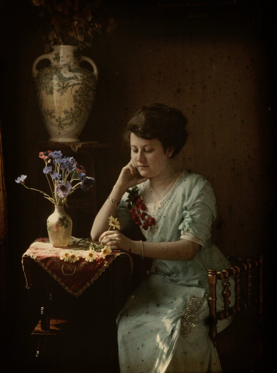 Kvinde med blomster af Johannes Hendrikus Antonius Maria Lutz