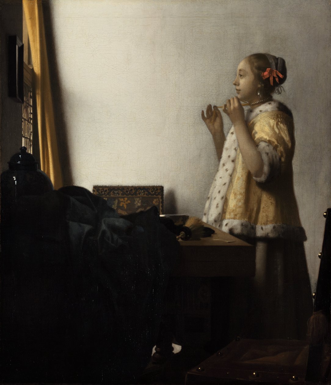 Ung dame med perlehalskæde af Johannes Vermeer
