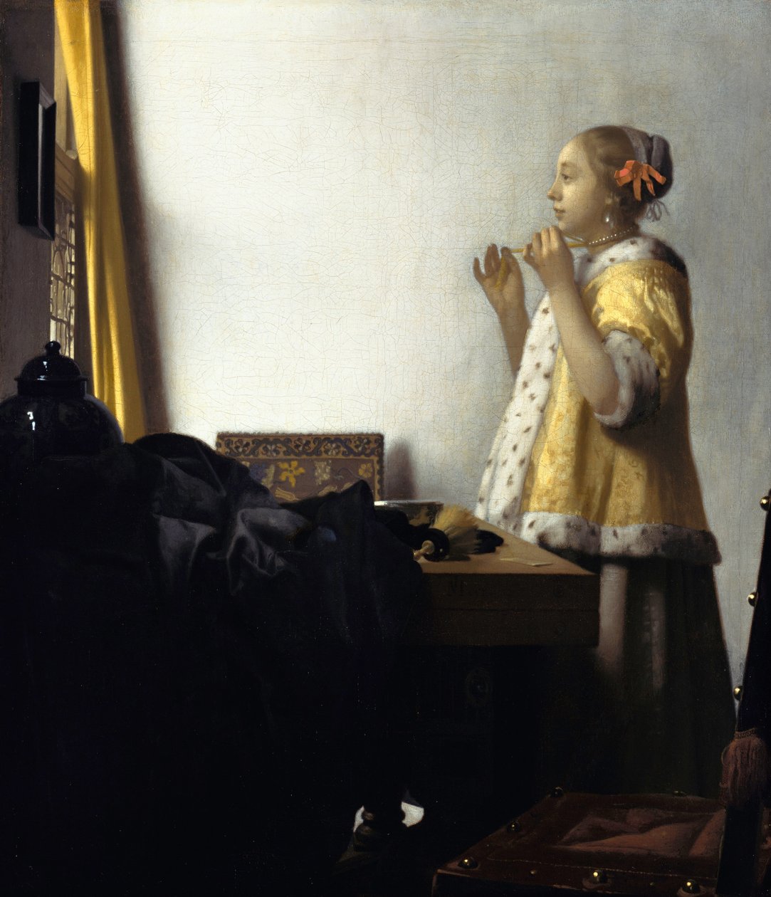 Ung kvinde med perlehalskæde af Johannes Vermeer