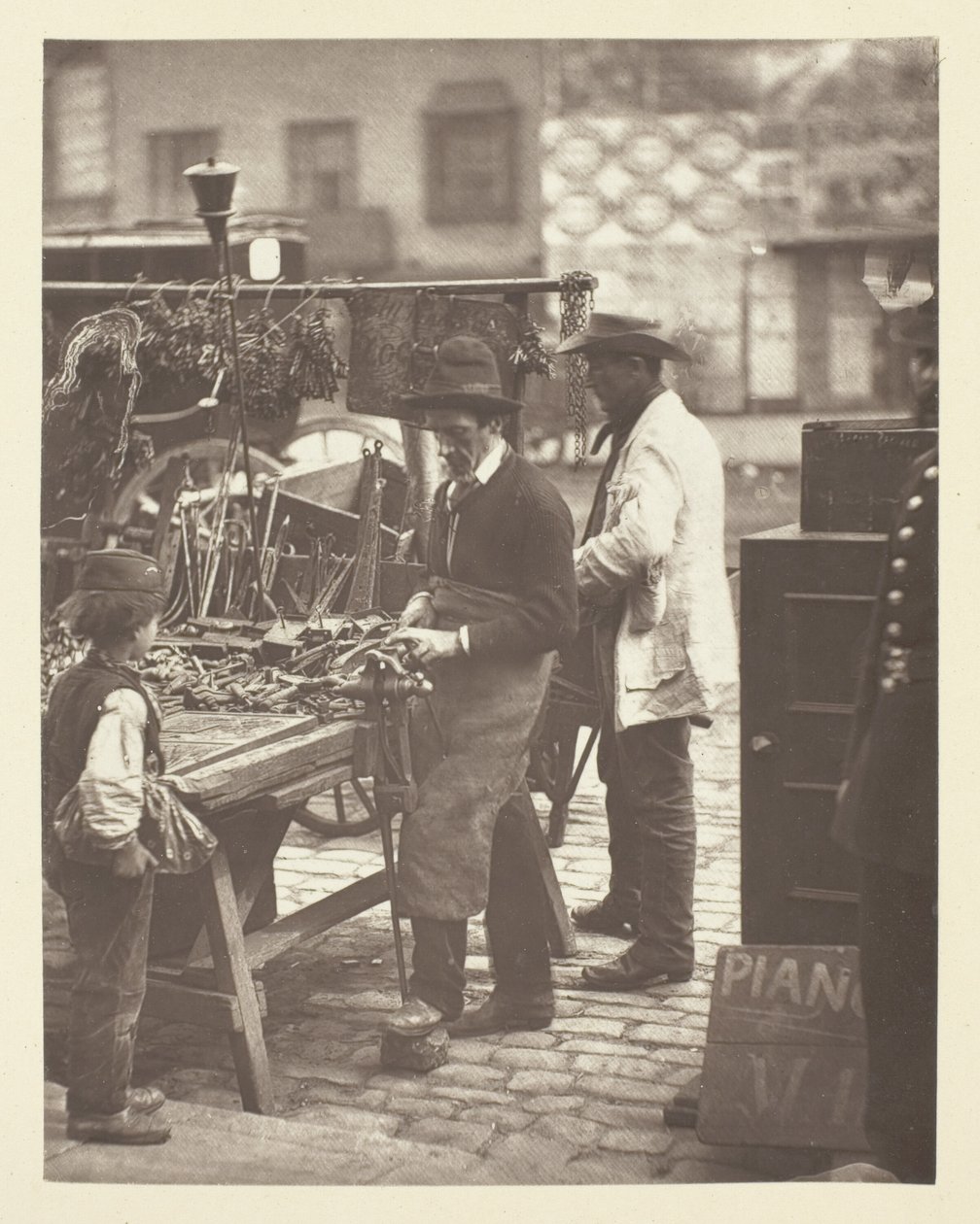 Gadelåsesmeden af John Thomson
