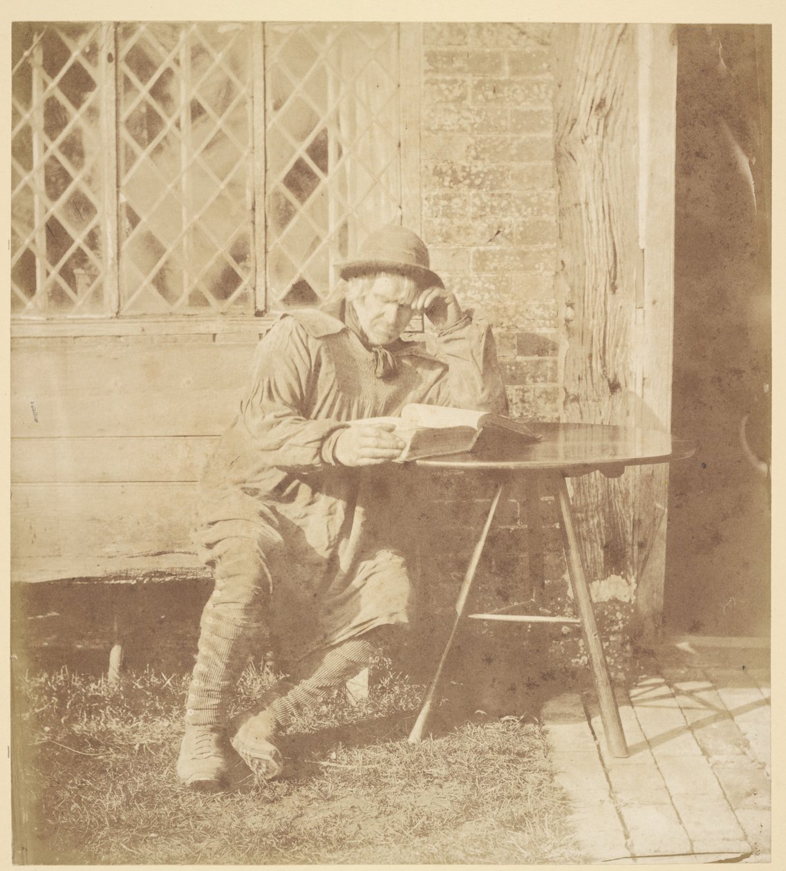 [Mand læser en bog] af John Whistler