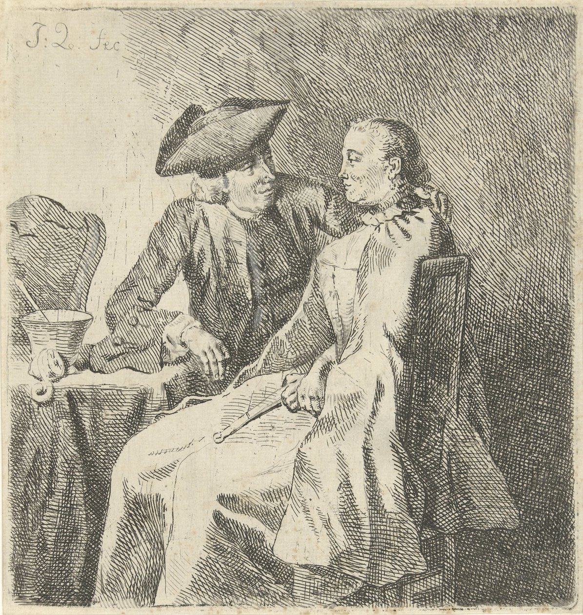 Mand og kvinde ved et bord af Julius Henricus Quinkhard