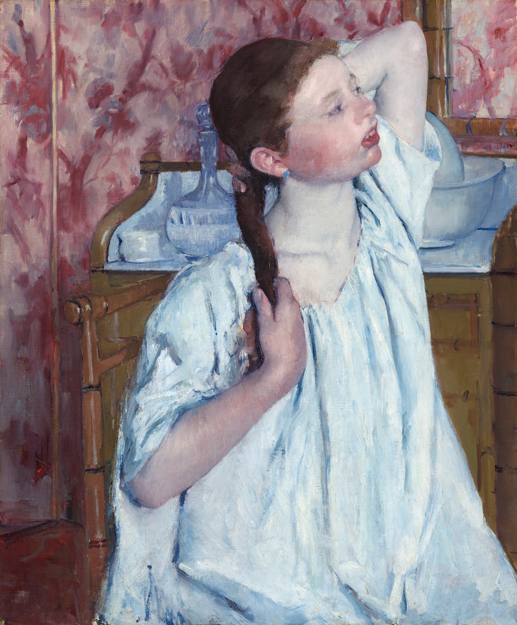 Pige arrangerer sit hår af Mary Cassatt