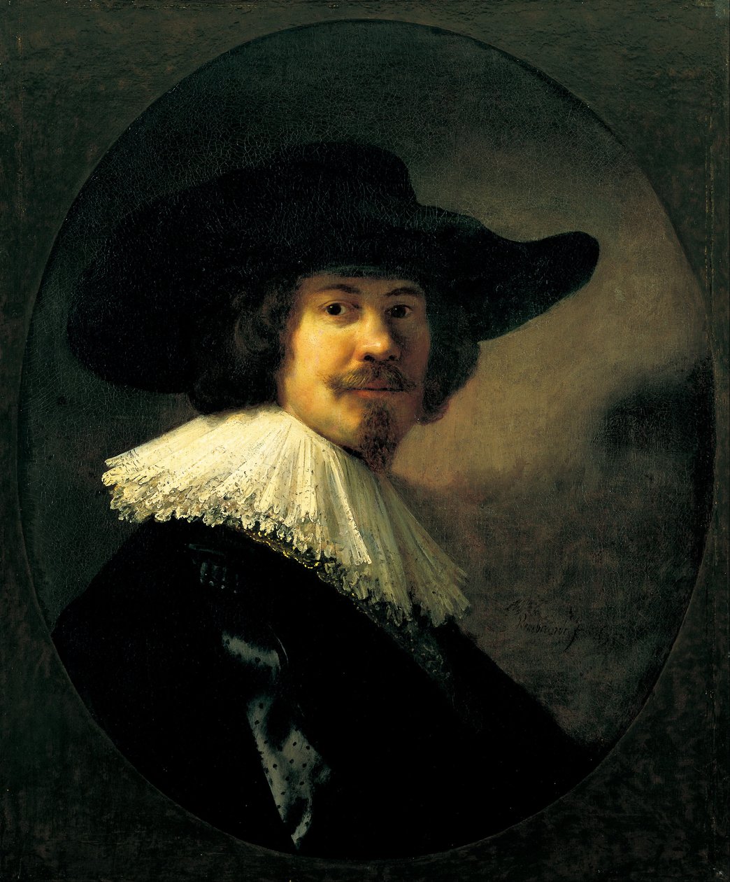 Portræt af en mand i en bredskygget hat af Rembrandt van Rijn