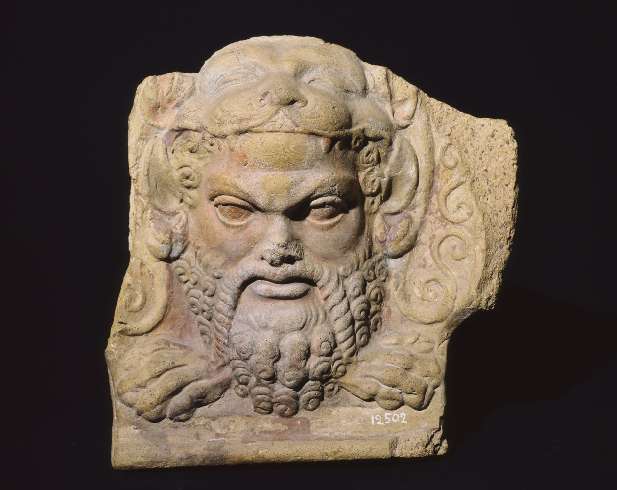 Antefiks, der forestiller hovedet af en mand, fra Sassi Cadutis tempel i Falerii af Roman