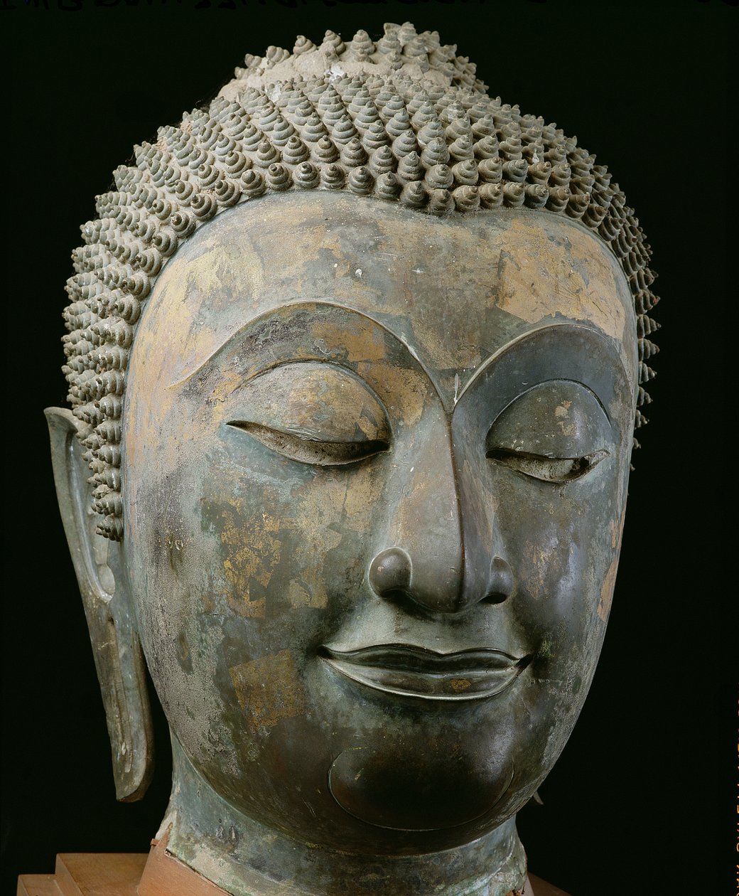 Hovedet af en kæmpe Buddha (bronze) af Thai