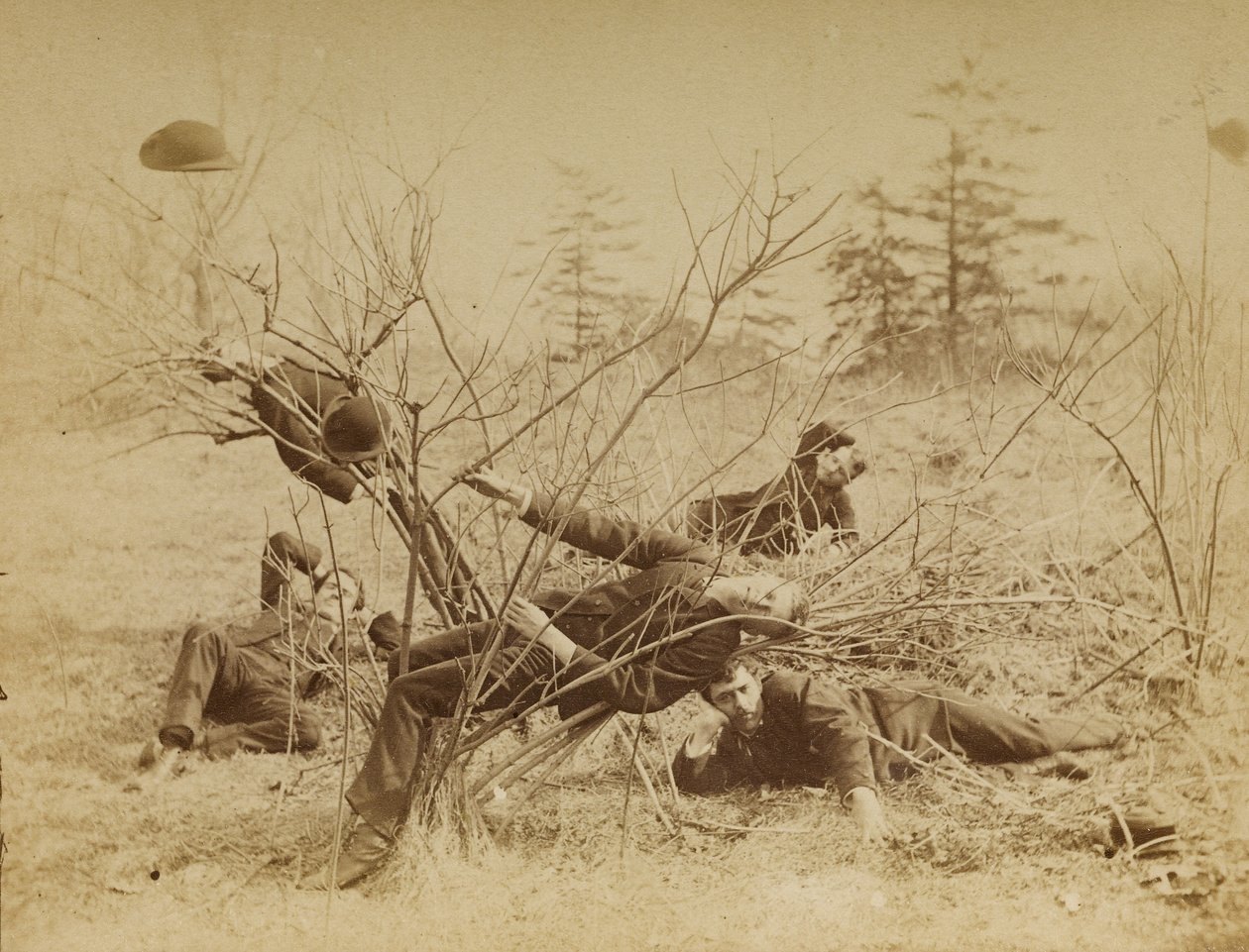 [Fire mandlige studerende, der ligger på terrassen]. af Thomas Eakins