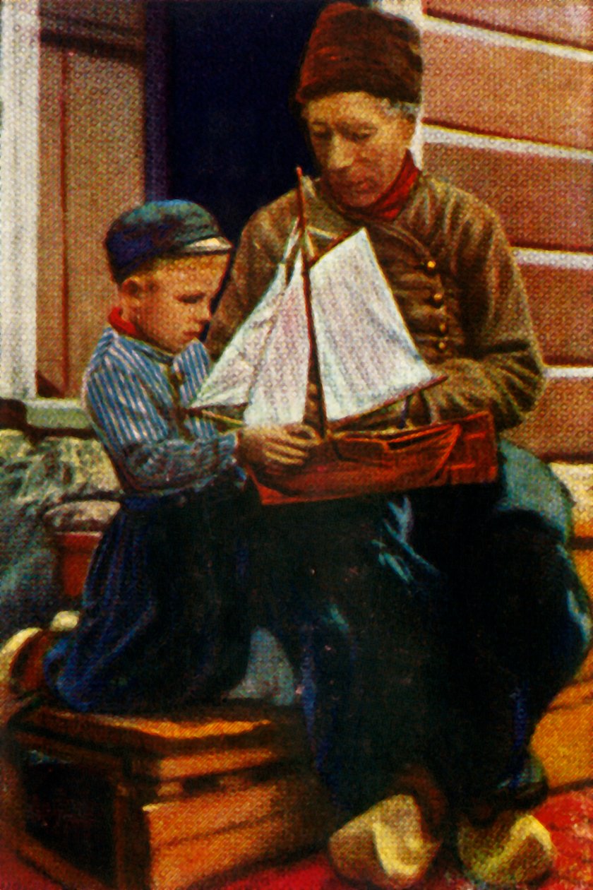 Hollandsk far og søn i traditionel dragt, c1928. af Unbekannt