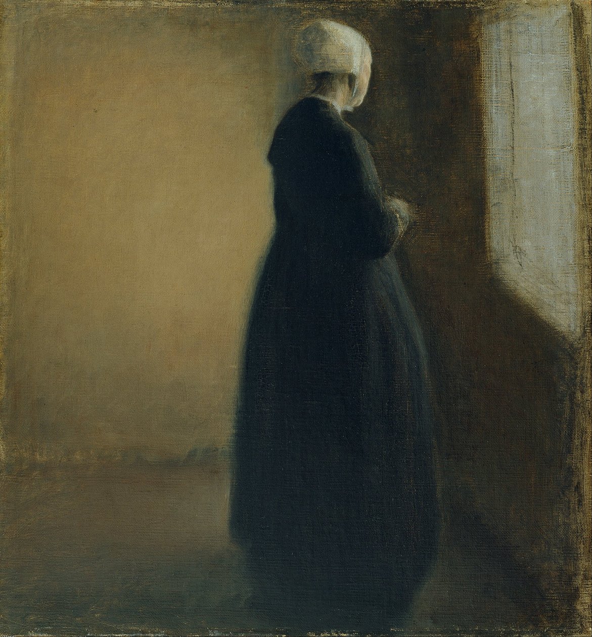 En gammel kvinde, der står ved et vindue af Vilhelm Hammershøi