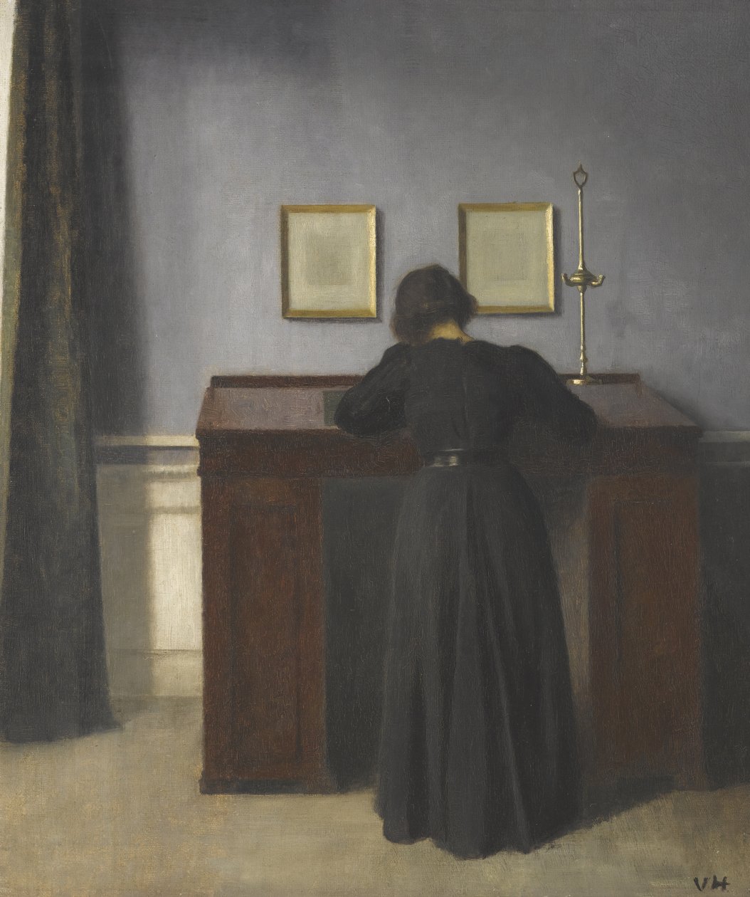 Ida står ved et skrivebord af Vilhelm Hammershøi