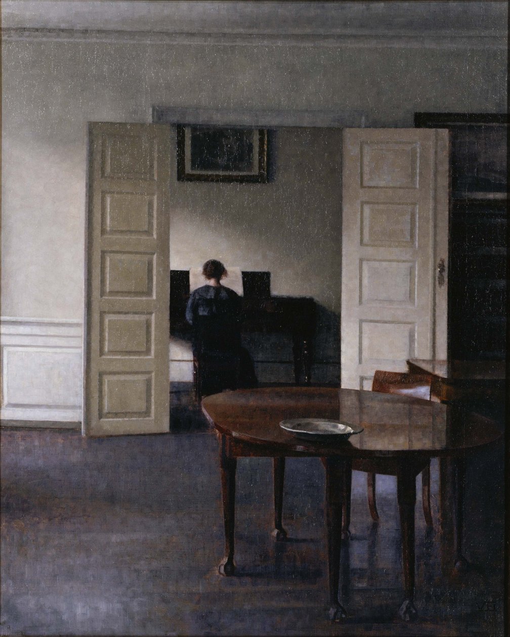 Interiør med Ida der spiller klaver af Vilhelm Hammershøi